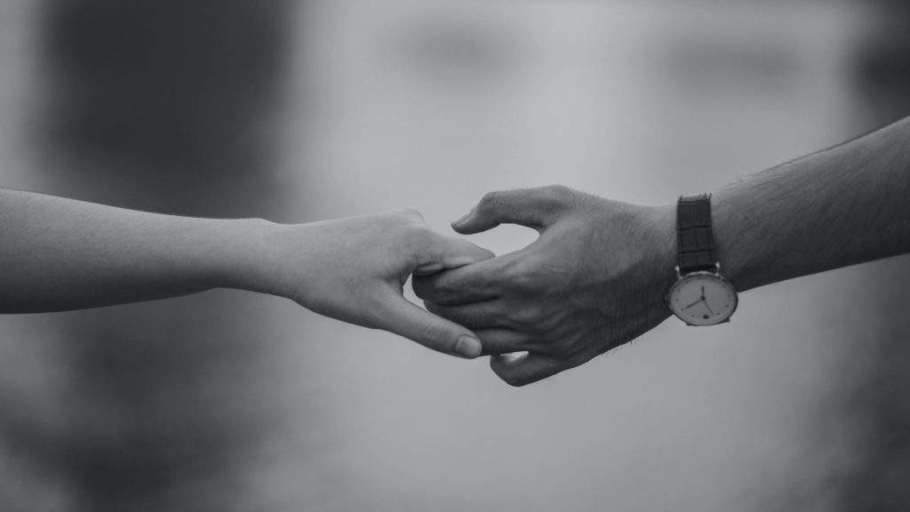 Photo by Min An on <a href="https://www.pexels.com/photo/monochrome-photo-of-couple-holding-hands-1004014/" rel="nofollow">Pexels.com</a>
