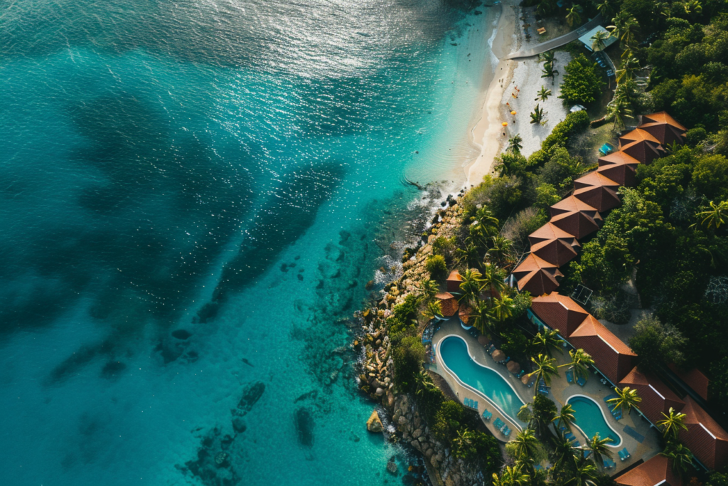 An aerial drone photograph of an inclusive resort in the Carribean. There are many islands in the Carribean which you can visit from the USA without a passport, and they have amazing weather year round. 